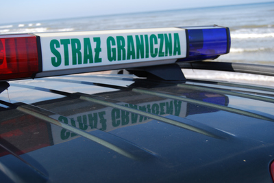 Oświetlenie pojazdu służbowego z napisem Straż Graniczna Oświetlenie pojazdu służbowego z napisem Straż Graniczna